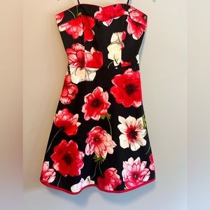 Le Chateau strapless summer dress with crinoline. Comes with a belt